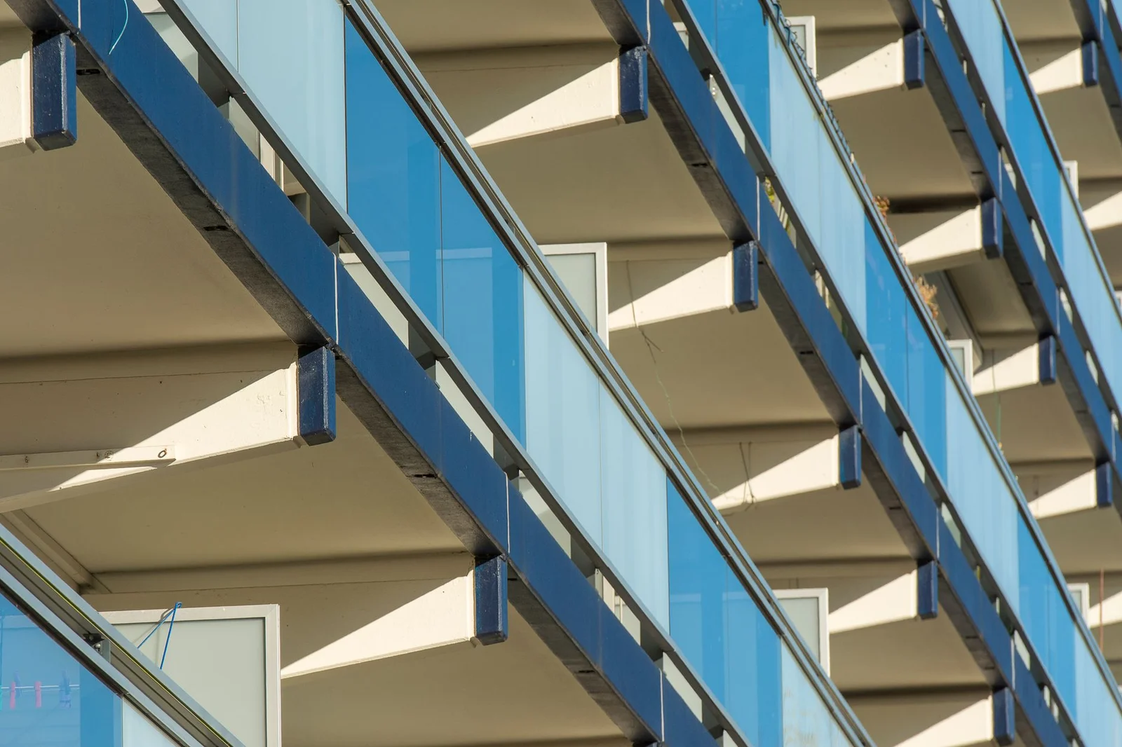 Close-up of geometric balconies on a modern hotel building.